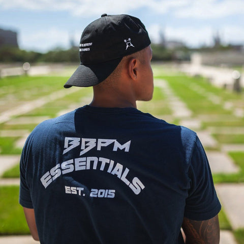 Man showing the front of the midnight navy Essentials Athletic T-Shirt